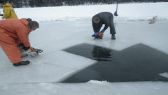 Chainsawing Through The Ice